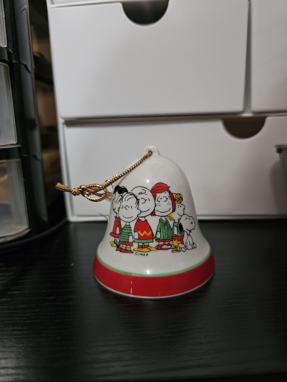 Holiday Peanuts Ceramic Bell Ornament in White and Red